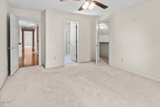121 Queensgate, Bristol, TN 37620 - unfurnished bedroom with attic access, light carpet, a walk in closet, ensuite bathroom, and ceiling fan