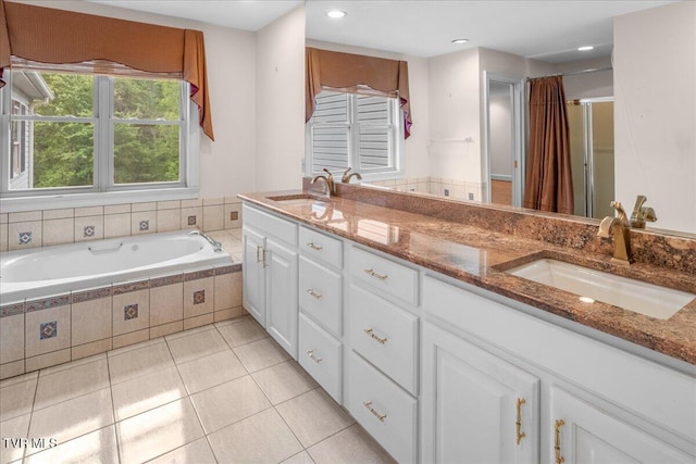 121 Queensgate, Bristol, TN 37620 - bathroom with tile patterned floors, double vanity, a garden tub, curtained shower, and recessed lighting