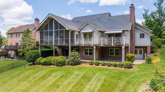 121 Queensgate, Bristol, TN 37620 - back of property featuring a wooden deck, a patio, brick siding, and a chimney