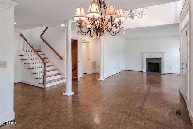 121 Queensgate, Bristol, TN 37620 - unfurnished living room featuring a chandelier, stairway, a fireplace with flush hearth, and recessed lighting