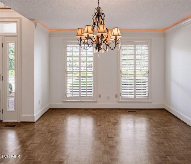 121 Queensgate, Bristol, TN 37620 - empty room with a chandelier, plenty of natural light, a textured ceiling, and ornamental molding