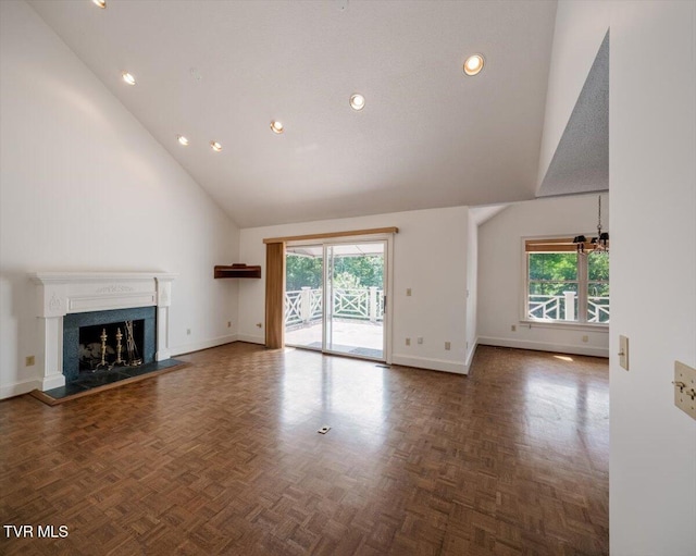 121 Queensgate, Bristol, TN 37620 - unfurnished living room with high vaulted ceiling, plenty of natural light, recessed lighting, a premium fireplace, and a chandelier