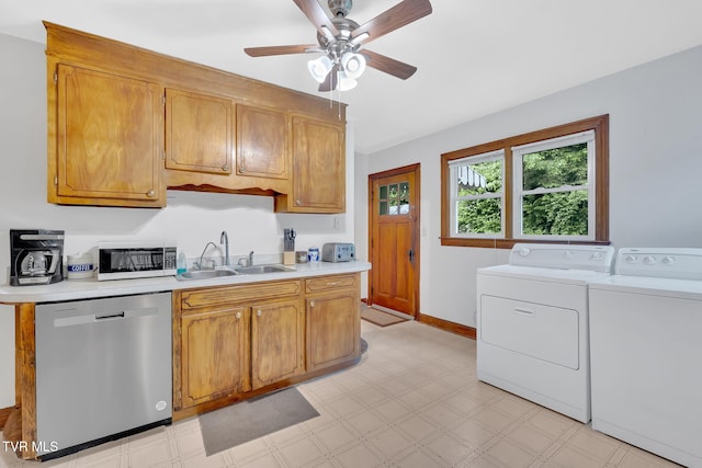 8836 Bristol Hwy, Hiltons, VA 24258 - kitchen featuring dishwasher, a sink, separate washer and dryer, light countertops, and a ceiling fan