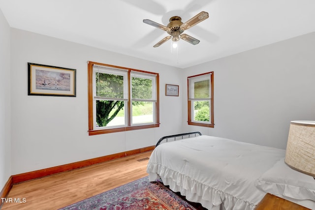 8836 Bristol Hwy, Hiltons, VA 24258 - bedroom with wood finished floors, baseboards, and a ceiling fan