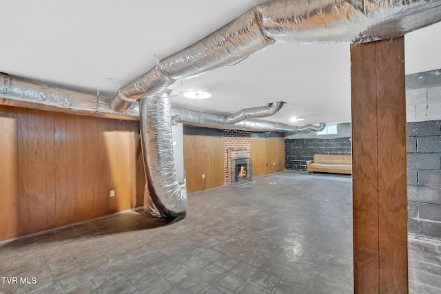 8836 Bristol Hwy, Hiltons, VA 24258 - finished basement with a brick fireplace and tile patterned floors