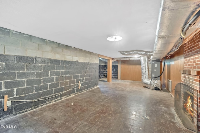 8836 Bristol Hwy, Hiltons, VA 24258 - unfinished below grade area with tile patterned floors, heating unit, and concrete block wall