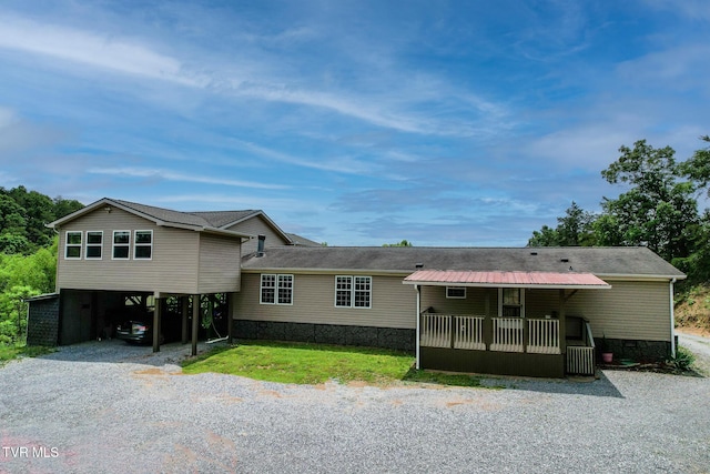558 Oakland Dr, Bybee, TN 37713 - view of front of property with driveway, a carport, and crawl space