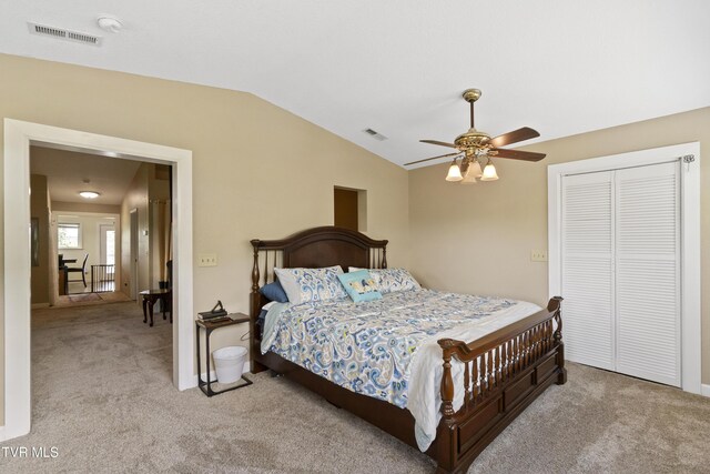 558 Oakland Dr, Bybee, TN 37713 - bedroom with carpet floors, vaulted ceiling, a closet, and a ceiling fan