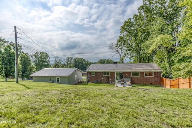 963 NE Woodlawn Ter, Abingdon, VA 24210 - rear view of house featuring brick siding and a patio