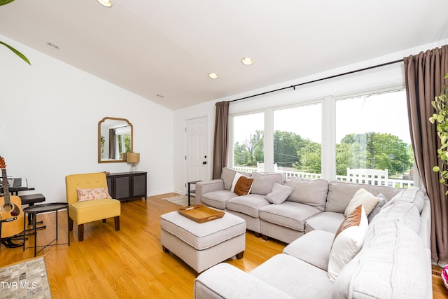 963 NE Woodlawn Ter, Abingdon, VA 24210 - living room featuring lofted ceiling, light wood finished floors, and recessed lighting