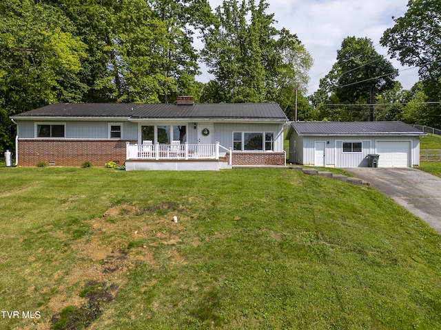 963 NE Woodlawn Ter, Abingdon, VA 24210 - single story home with board and batten siding, a chimney, brick siding, a garage, and driveway