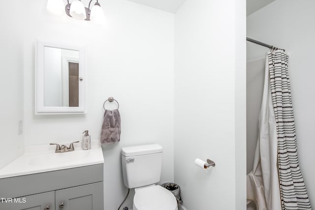 963 NE Woodlawn Ter, Abingdon, VA 24210 - full bath featuring vanity, toilet, and a shower with curtain