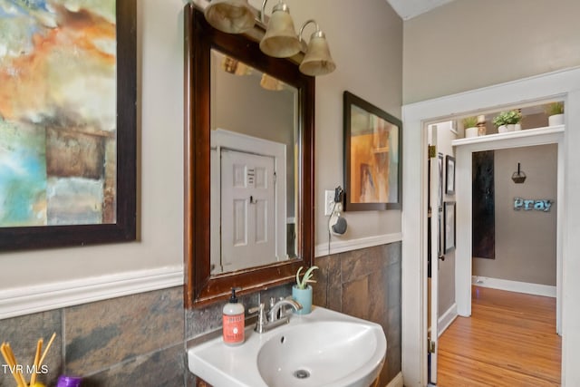 408 N Main St, Greeneville, TN 37745 - bathroom featuring a sink and wood finished floors