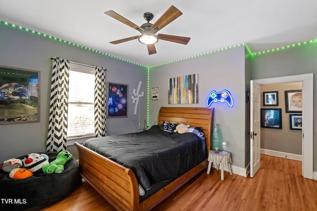 408 N Main St, Greeneville, TN 37745 - bedroom featuring wood finished floors, baseboards, and ceiling fan