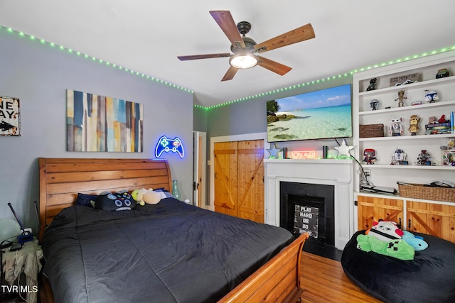 408 N Main St, Greeneville, TN 37745 - bedroom with wood finished floors and ceiling fan