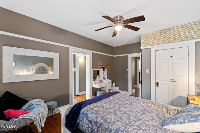 408 N Main St, Greeneville, TN 37745 - bedroom featuring wood finished floors, baseboards, and a ceiling fan