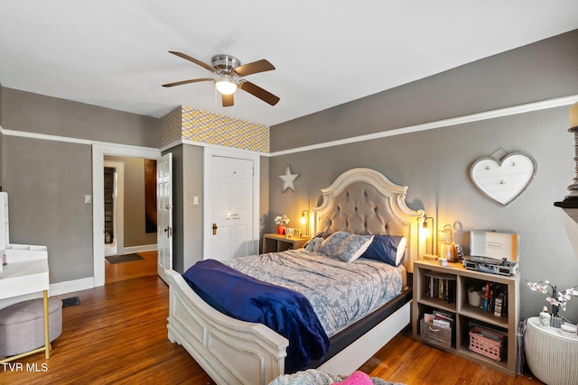 408 N Main St, Greeneville, TN 37745 - bedroom with wood finished floors, a ceiling fan, and baseboards