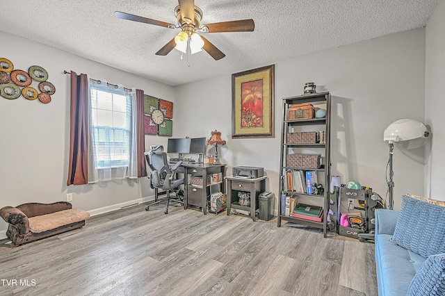 204 E Mountain View Rd # 20, Johnson City, TN 37601 - home office featuring wood finished floors, a ceiling fan, a textured ceiling, and baseboards