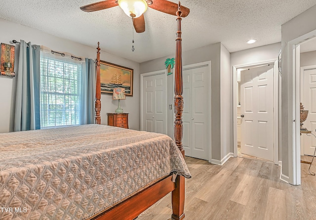 204 E Mountain View Rd # 20, Johnson City, TN 37601 - bedroom featuring light wood-style floors, a textured ceiling, baseboards, and ceiling fan