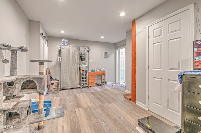204 E Mountain View Rd # 20, Johnson City, TN 37601 - workout area with wood finished floors, baseboards, and recessed lighting