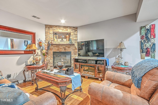204 E Mountain View Rd # 20, Johnson City, TN 37601 - living area with wood finished floors and a stone fireplace
