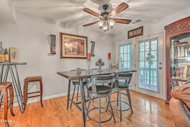 204 E Mountain View Rd # 20, Johnson City, TN 37601 - dining space featuring a ceiling fan, light wood finished floors, and baseboards