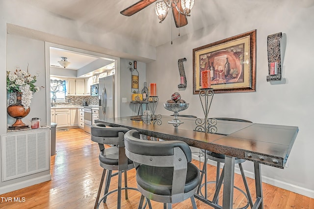204 E Mountain View Rd # 20, Johnson City, TN 37601 - dining area with ceiling fan, light wood-style flooring, and baseboards