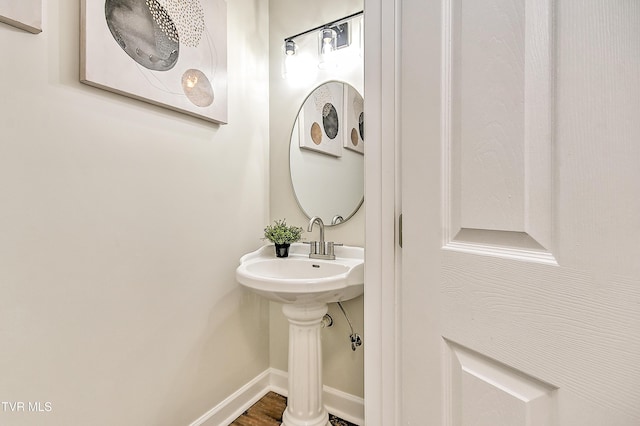 bathroom featuring baseboards