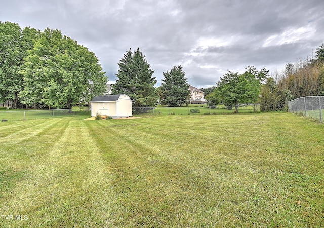 view of yard with a storage unit and an outdoor structure