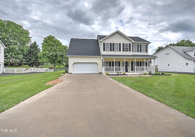 view of front facade with covered porch, driveway, and an attached garage