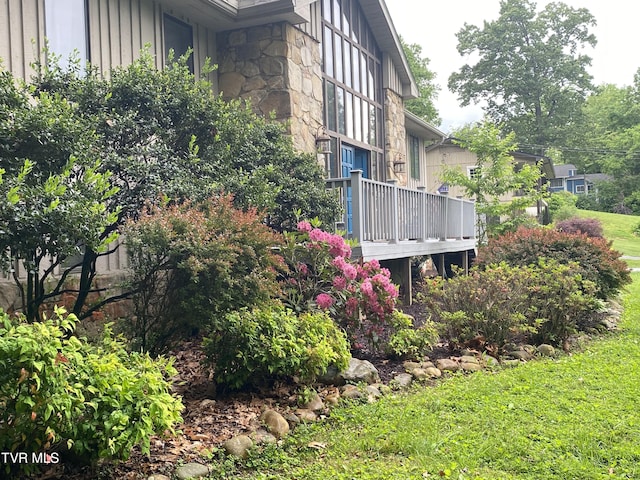 203 Oak Ln, Johnson City, TN 37604 - view of side of property with stone siding, board and batten siding, and a deck