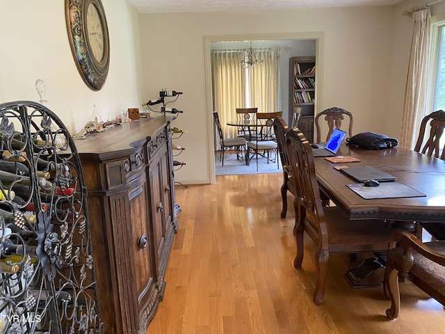 203 Oak Ln, Johnson City, TN 37604 - dining space featuring light wood finished floors and a chandelier