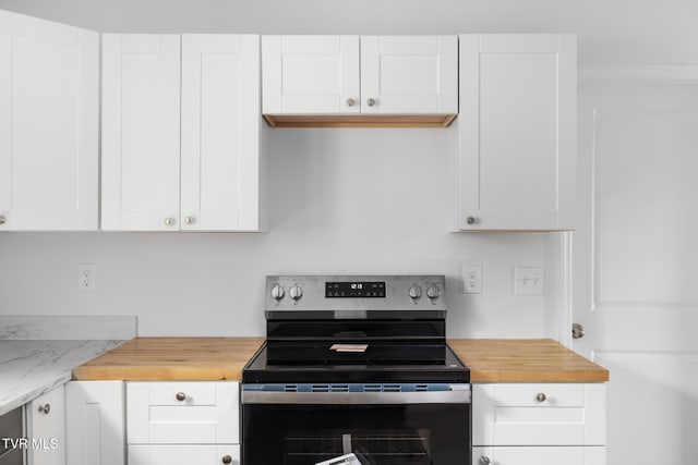 1410 Anderson St, Bristol, TN 37620 - kitchen featuring electric range, butcher block counters, and white cabinets