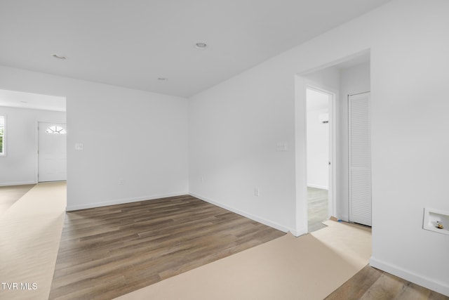1410 Anderson St, Bristol, TN 37620 - unfurnished room with wood finished floors, baseboards, and recessed lighting