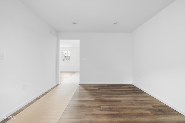 1410 Anderson St, Bristol, TN 37620 - unfurnished room featuring wood finished floors, baseboards, and recessed lighting