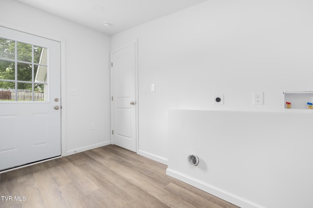 1410 Anderson St, Bristol, TN 37620 - washroom featuring hookup for an electric dryer, wood finished floors, washer hookup, and baseboards