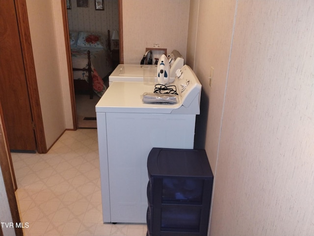 6560 Gilliam Rd, Wise, VA 24293 - washroom featuring light floors and washer and clothes dryer