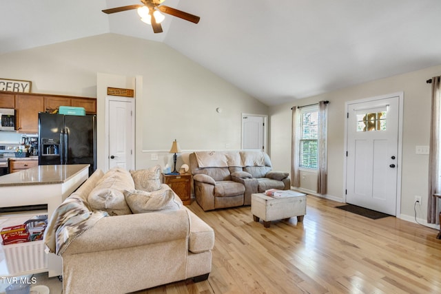 1086 Quaker Run, Telford, TN 37690 - living room with lofted ceiling, ceiling fan, and light wood-type flooring