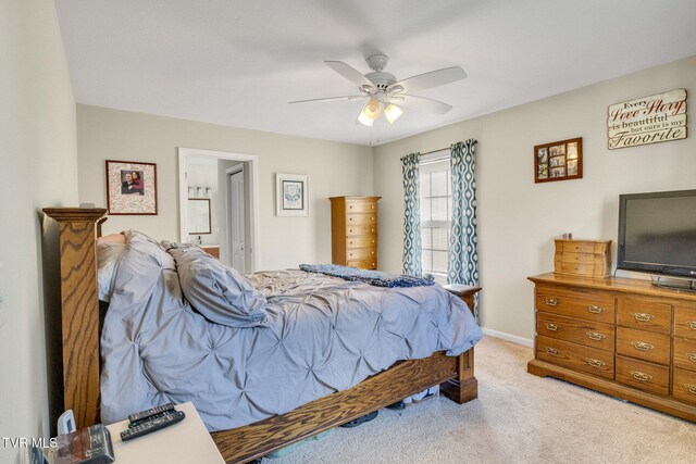 1086 Quaker Run, Telford, TN 37690 - bedroom with light carpet, ceiling fan, baseboards, and ensuite bathroom