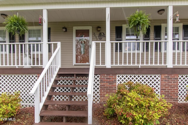 3493 Weaver Pike, Bristol, TN 37620 - doorway to property with covered porch and brick siding