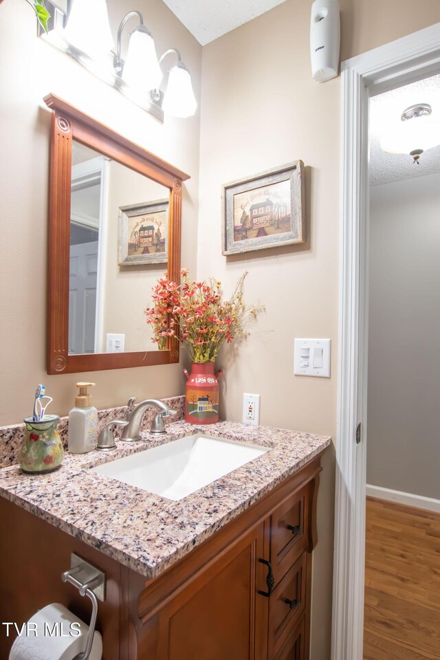 3493 Weaver Pike, Bristol, TN 37620 - bathroom featuring wood finished floors and vanity