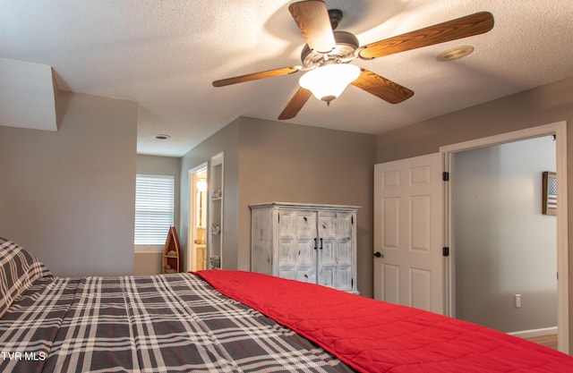 3493 Weaver Pike, Bristol, TN 37620 - bedroom featuring a textured ceiling, ceiling fan, and ensuite bath