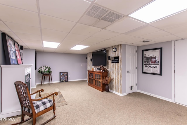 3493 Weaver Pike, Bristol, TN 37620 - sitting room featuring carpet, a paneled ceiling, baseboards, and a fireplace