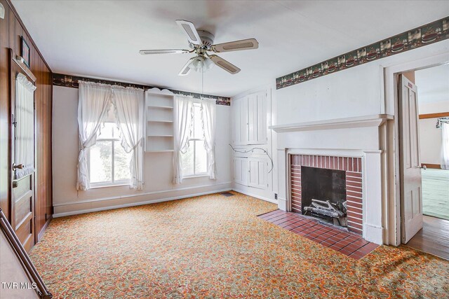 454 Cedar St, Bluff City, TN 37618 - unfurnished living room with ceiling fan and a fireplace