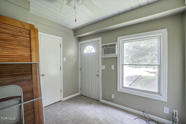 454 Cedar St, Bluff City, TN 37618 - entrance foyer featuring an AC wall unit, carpet floors, and a ceiling fan