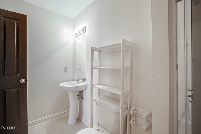 454 Cedar St, Bluff City, TN 37618 - bathroom featuring baseboards and toilet