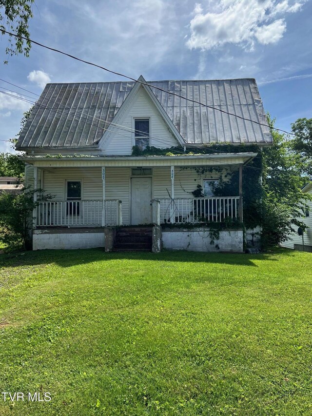 454 Cedar St, Bluff City, TN 37618 - view of front of property featuring covered porch, a standing seam roof, and a metal roof