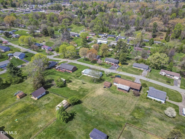 aerial overview of property's location with nearby suburban area