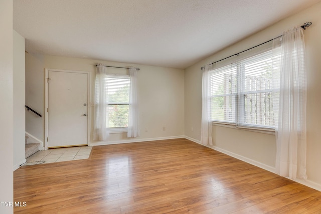 515 Pilgrim Ct Unit B, Johnson City, TN 37601 - foyer entrance with light wood-style floors, stairs, and baseboards