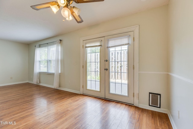 515 Pilgrim Ct Unit B, Johnson City, TN 37601 - entryway with french doors, ceiling fan, light wood finished floors, and baseboards